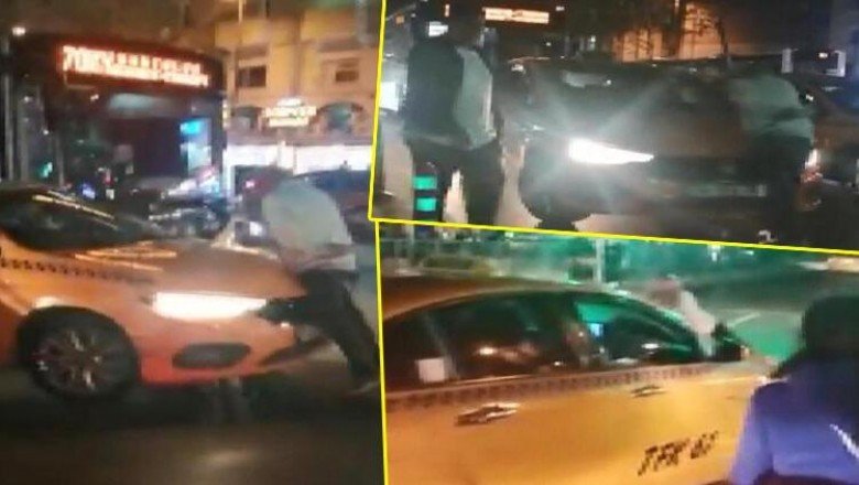 Beyoğlu'nda alınmadığı taksinin üstüne çıkarak tepki gösterdi