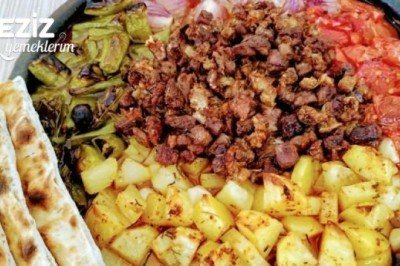 Eli Böğründe (Yan Yana) Tarifi